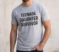 Teenage Daughter Survivor | Daughter for Dad - Funny Shirt Men - Fathers Day Gift - Husband TShirt - Funny Dad Tee - Dad Funny Shirt